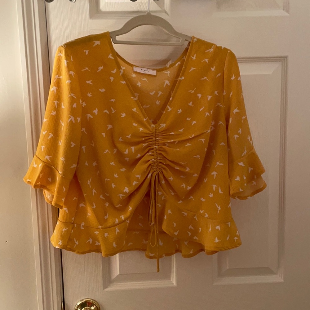 Yellow and white cropped shirt